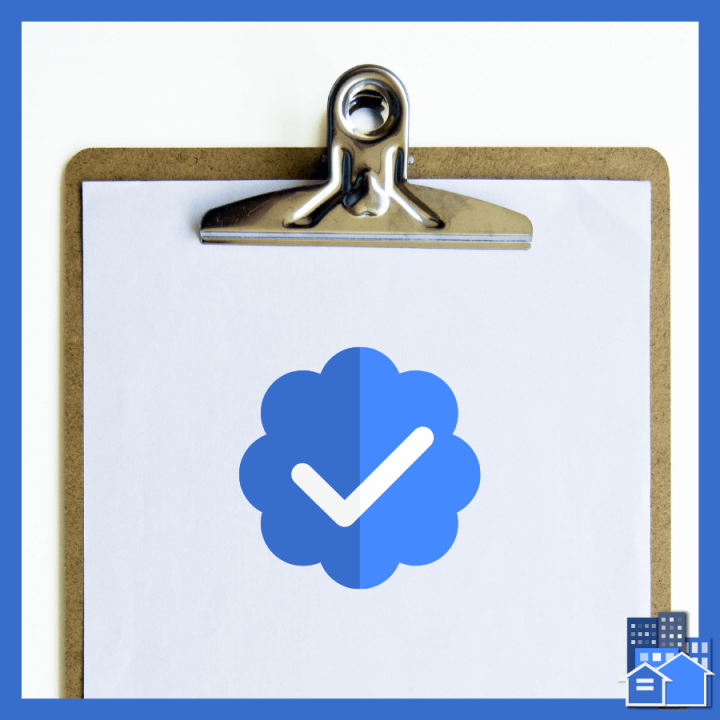 Clip board with a blue checkmark symbol on a verification form.